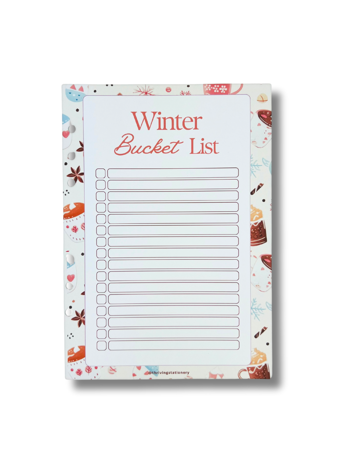 Notepad with 'Winter Bucket List' on a white background