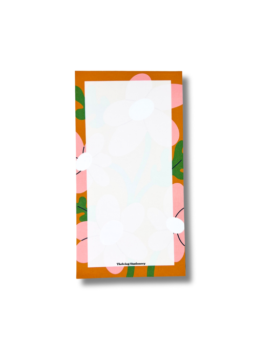Bold Blossoms Personalized Notepad with vibrant floral border and blank pages