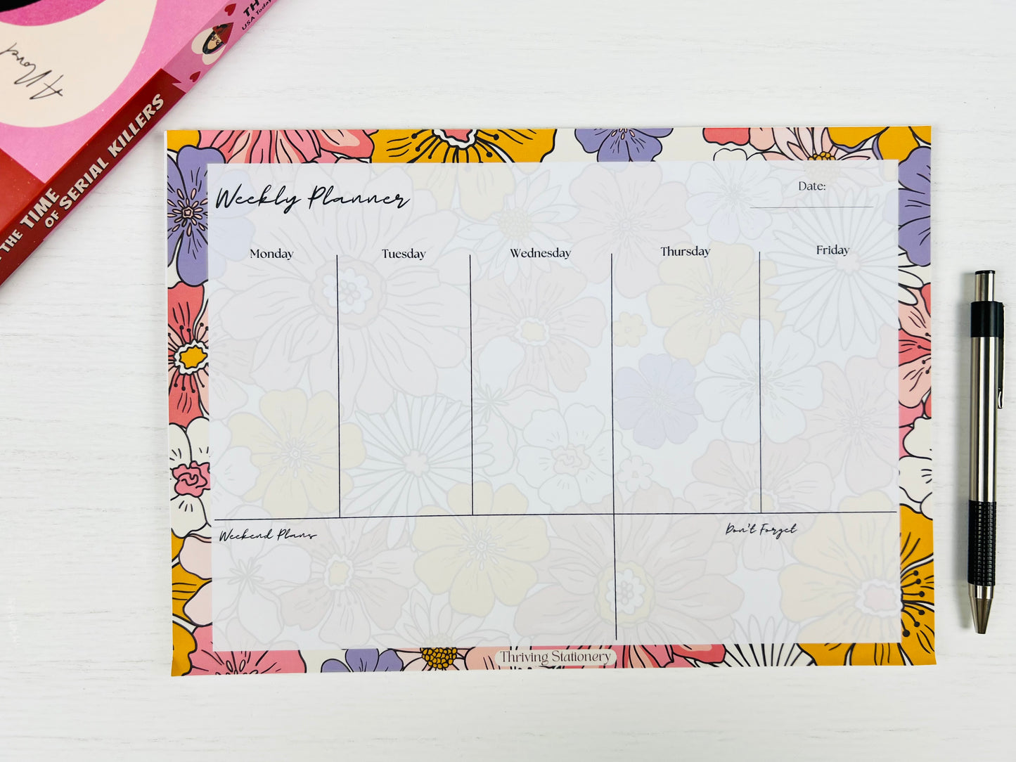 Bright Floral Weekly Planner Deskpad with vibrant floral design and weekly layout