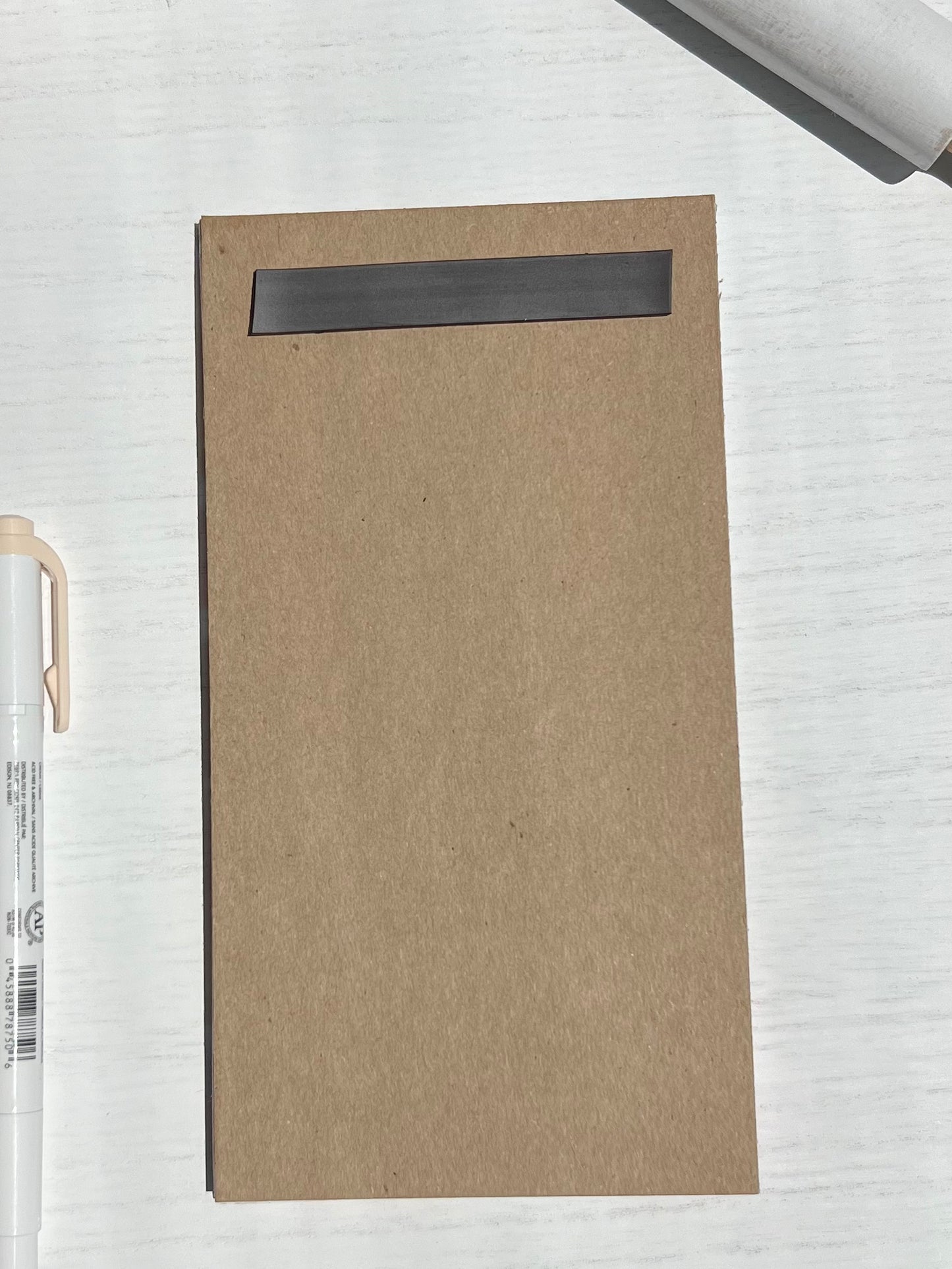 Magnetic grocery list notepad with a bright red cherry fruit design and lined checklist with tear-away sheets.