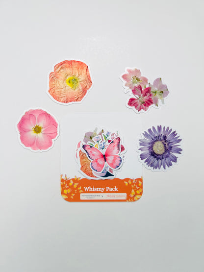 Floral-themed stickers with a 'Whimsy Pack' label on a white background