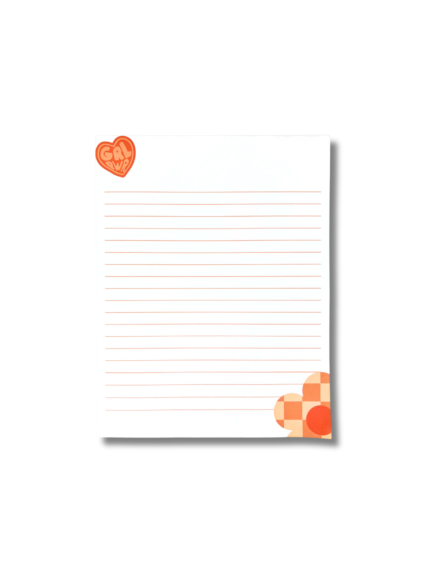 Notepad with lined pages and heart designs on a white background