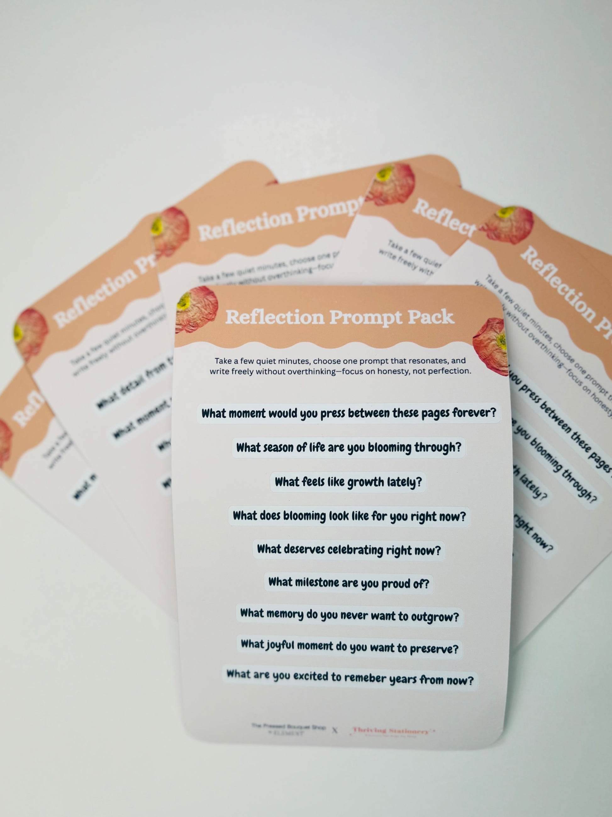 Collection of reflection prompt cards on a white background