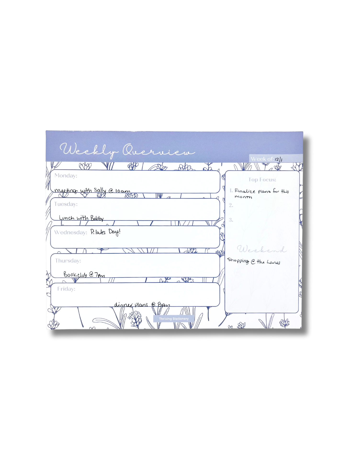 Weekly overview planner with floral design on a white background