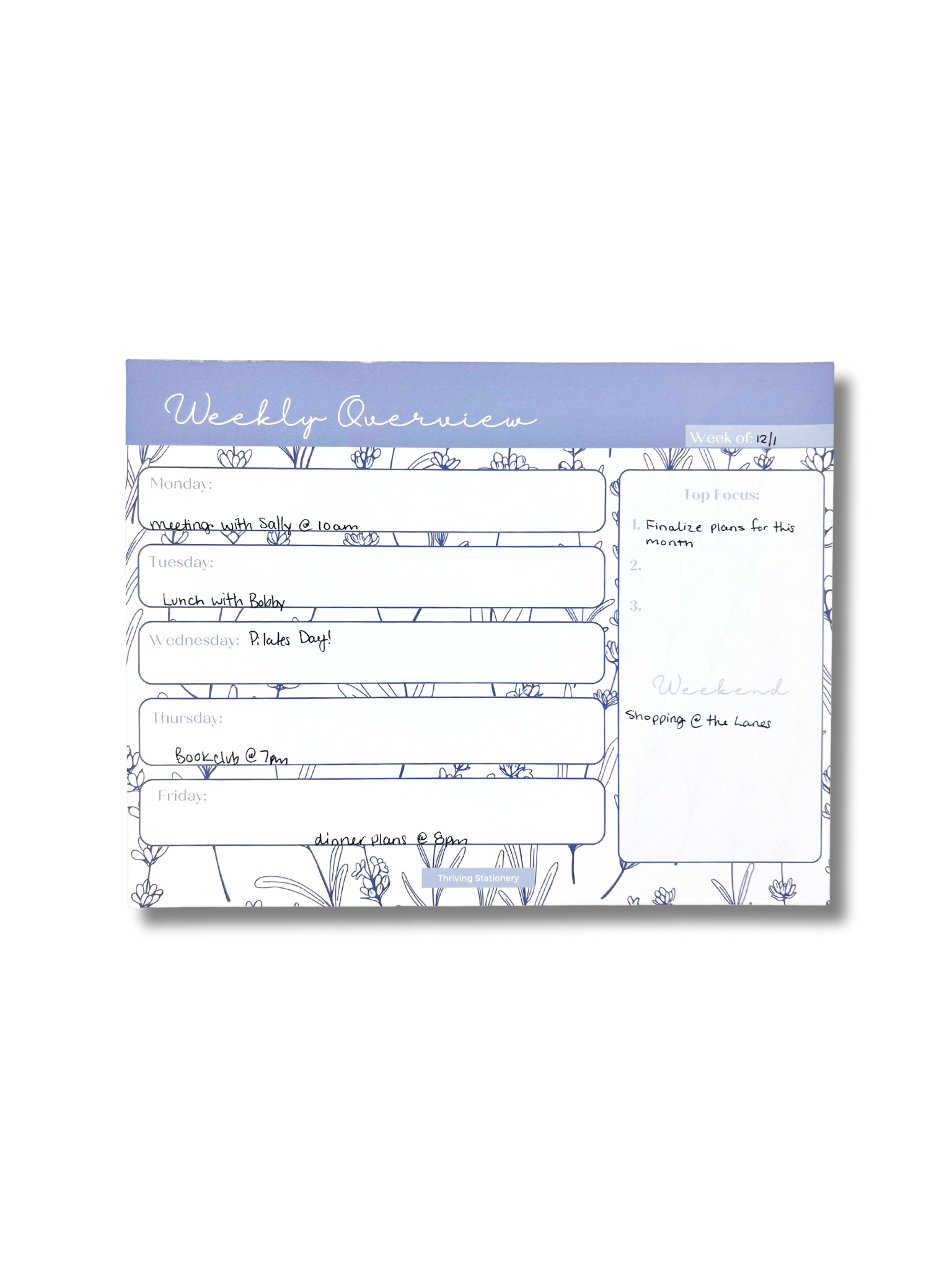 Weekly overview planner with floral design on a white background