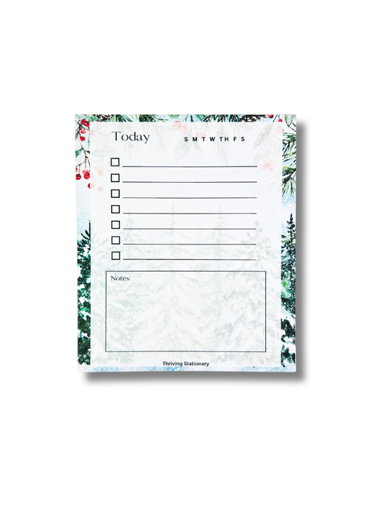 Floral-themed notepad with a weekly planner layout on a white background