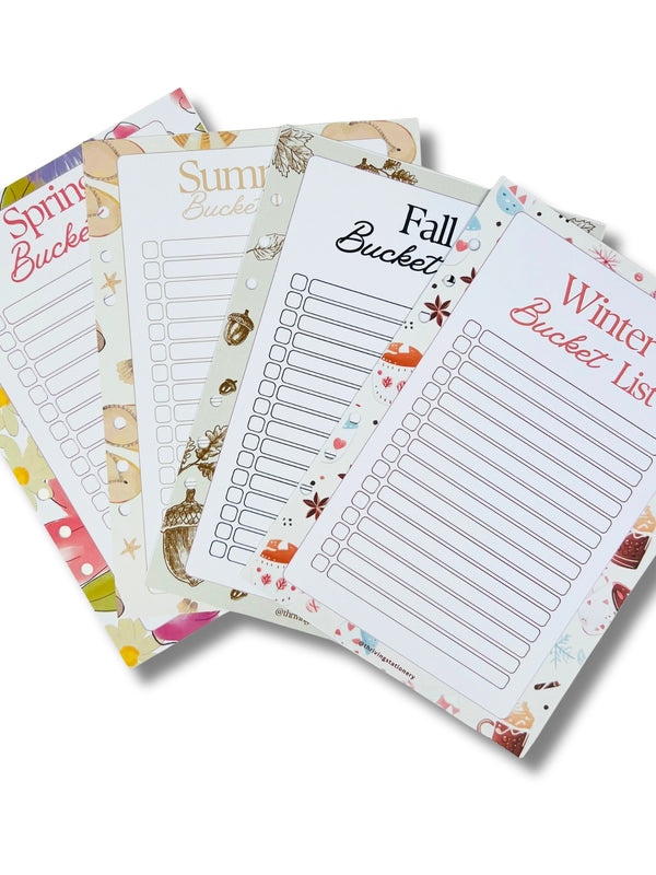 Four seasonal bucket list pads with spring, summer, fall, and winter designs on a white background.