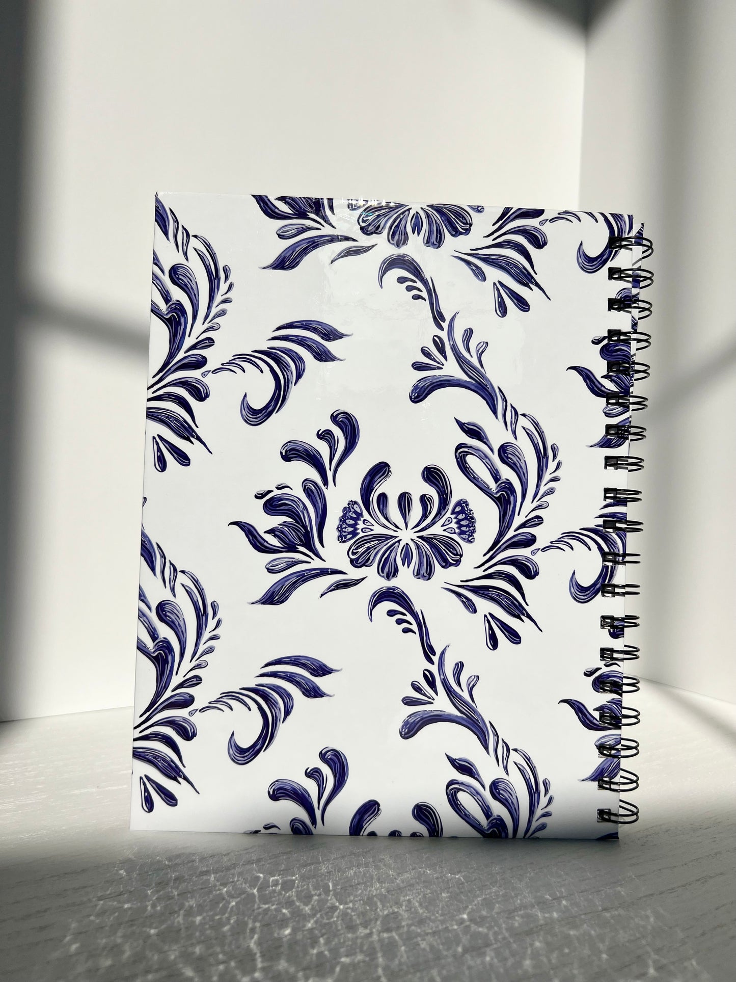 Blue Floral Spiral Notebook with white cover and navy floral pattern