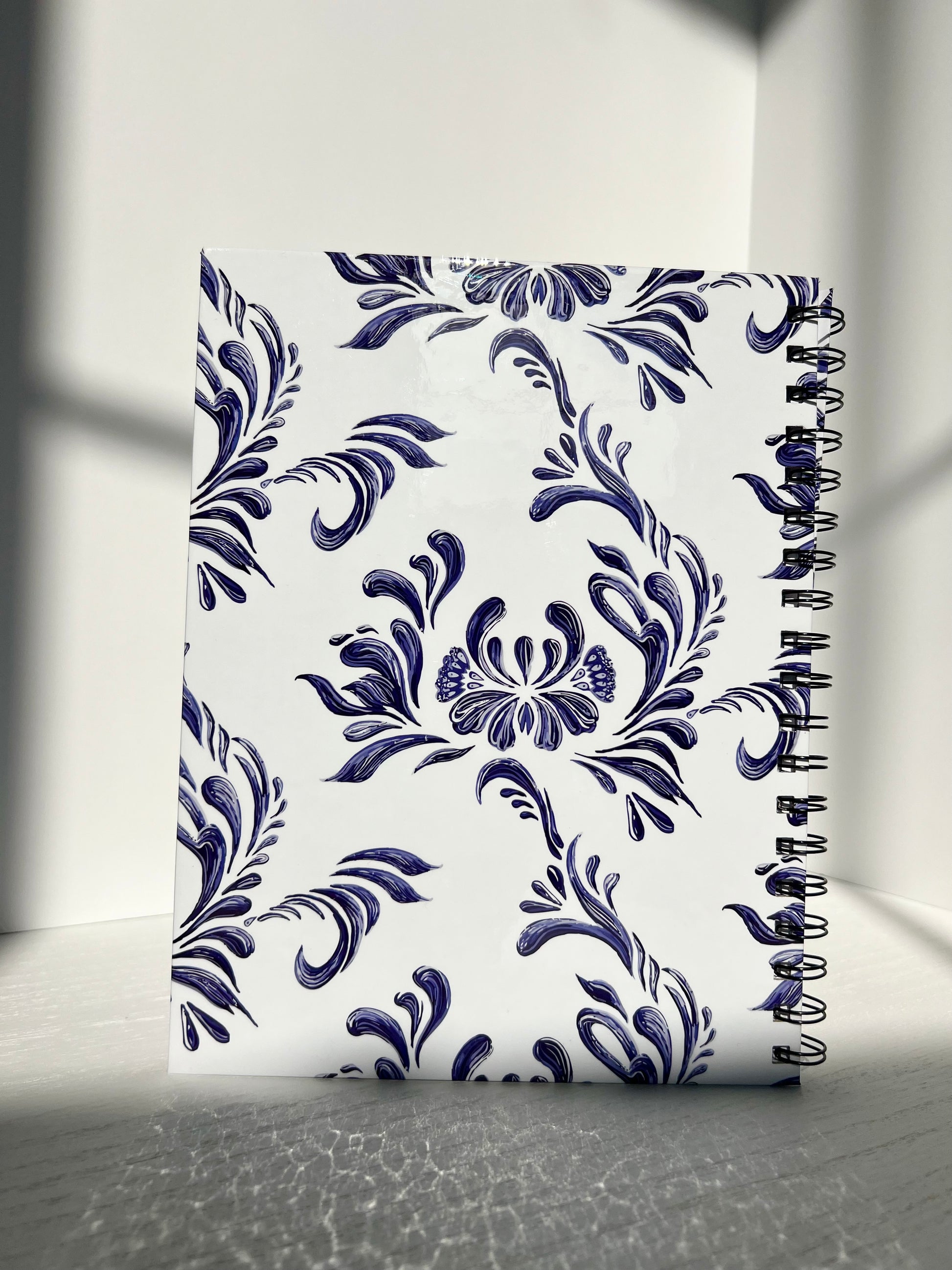 Blue Floral Spiral Notebook with white cover and navy floral pattern