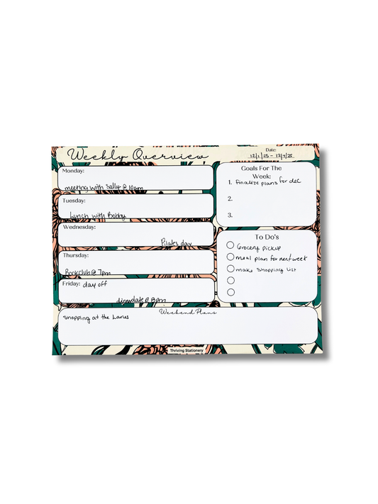 Bold Floral Weekly Planner with vibrant floral design and weekly layout