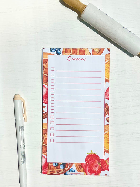 A lined grocery and shopping list with a peach design and the title 'Breakfast All Day' written at the top.