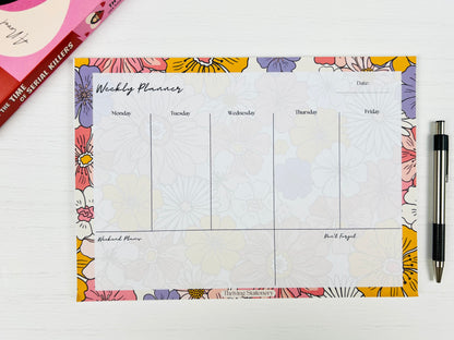 Bright Floral Weekly Planner Deskpad with vibrant floral design and weekly layout