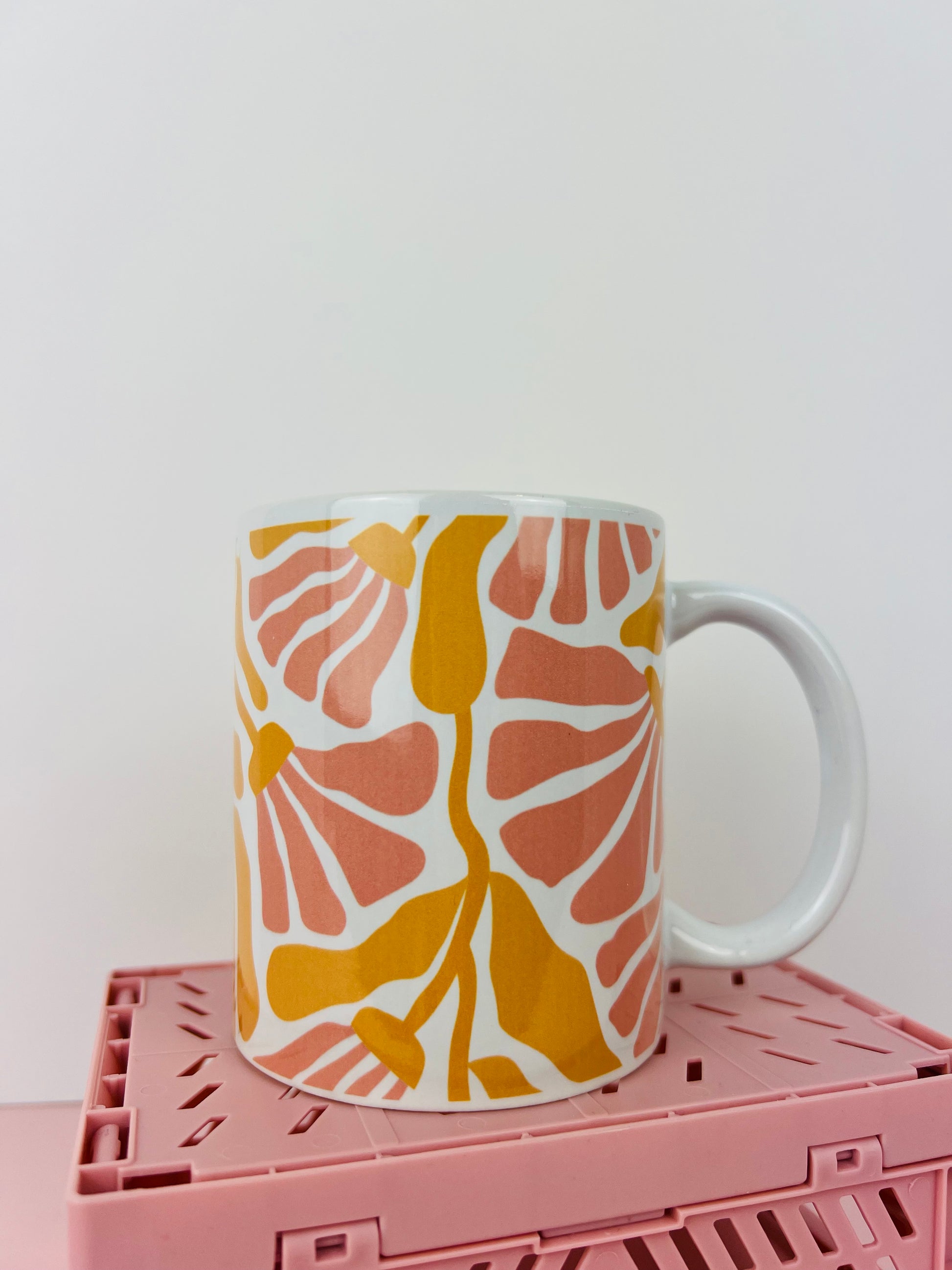 Coral Bloom Ceramic 11oz Mug with coral and mustard floral pattern on white base