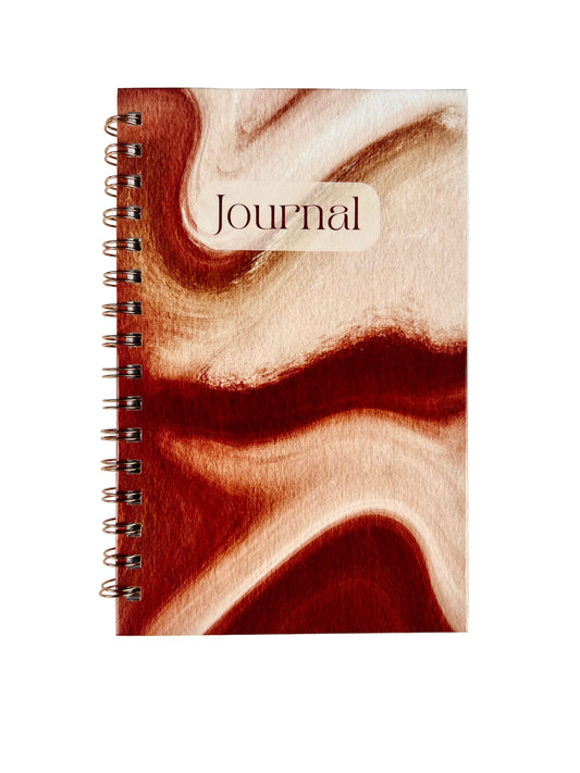 Journal with a wooden texture cover on a white background