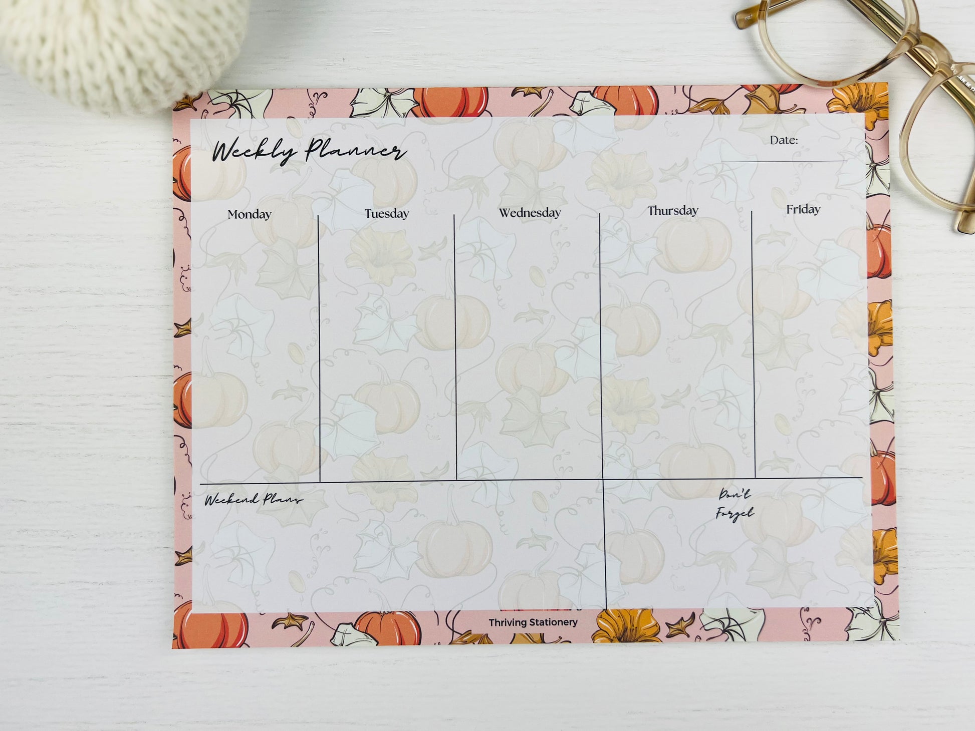 Autumn Weekly Planner Notepad with pumpkin and fall flower design and weekly layout