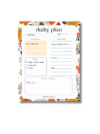 Vibrant Floral Daily Planner Notepad with colorful floral design
