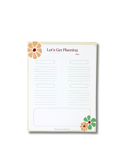Notepad with 'Let's Get Planning' text and floral designs on a white background