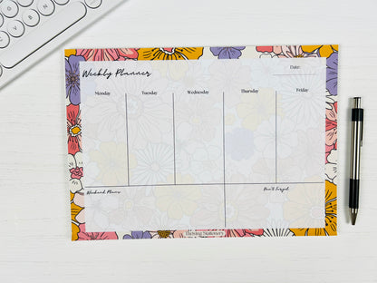 Bright Floral Weekly Planner Deskpad with vibrant floral design and weekly layout