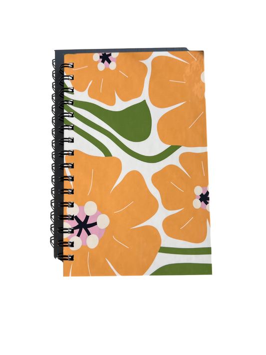 Golden Bloom Spiral Journal with yellow floral cover and spiral binding