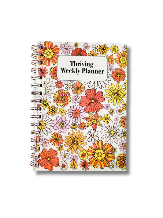 Floral weekly planner with 'Thrive Weekly Planner' text on a white background