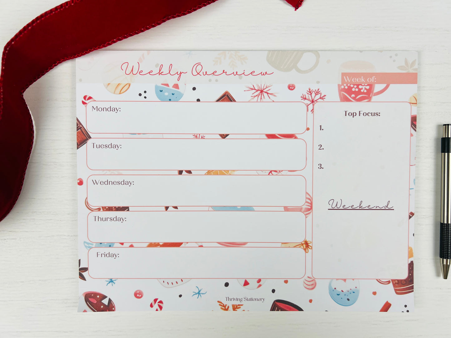 Weekly overview planner with colorful design on a white surface