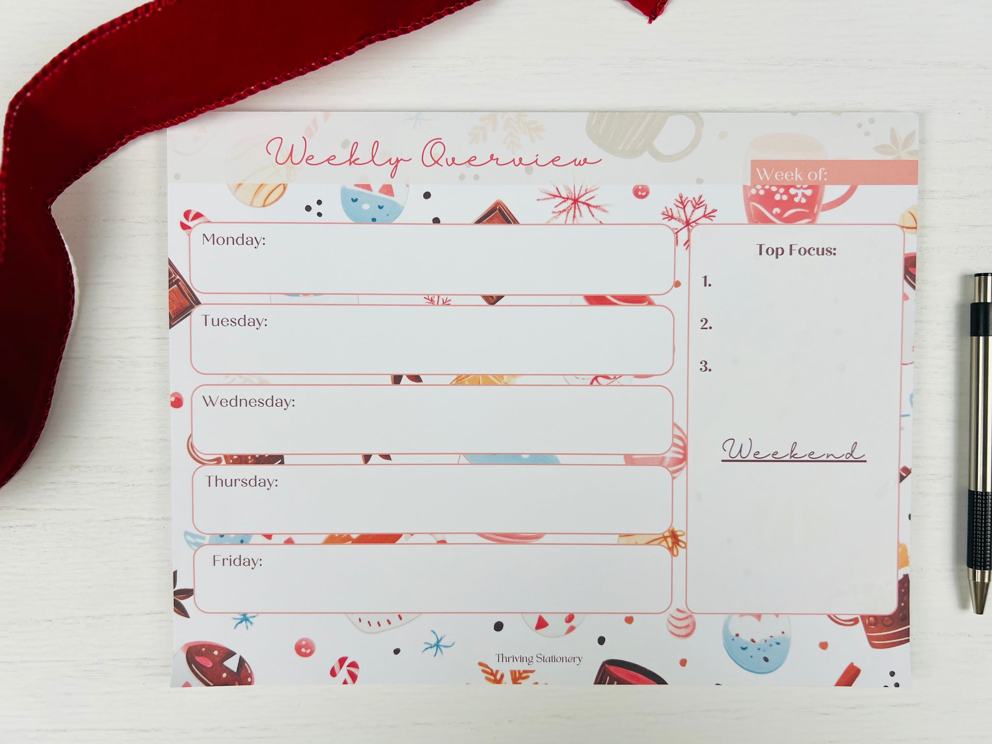 Weekly overview planner with colorful design on a white surface