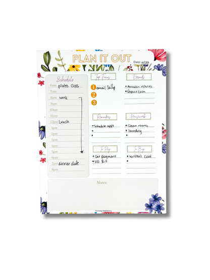 Floral-themed planner notepad with a schedule and notes section on a white background