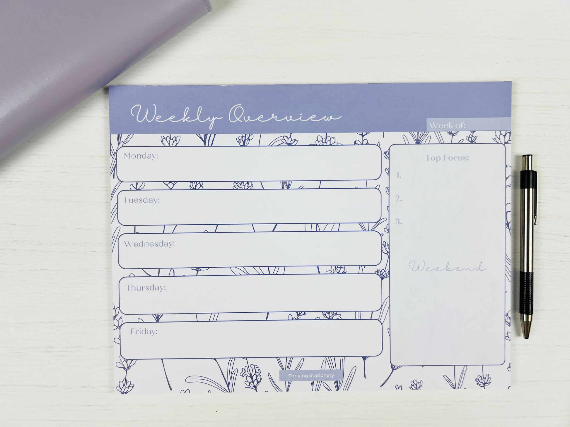 Purple Floral Weekly Planner Deskpad with soft floral design and weekly layout