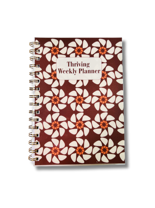 Weekly planner with floral pattern on a white background