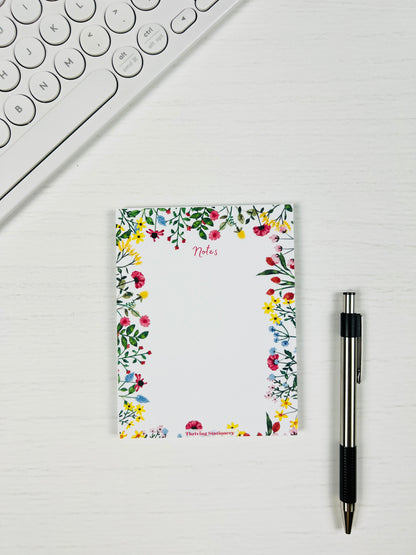 Vibrant Floral Personalized Notepad with bright floral design and blank pages