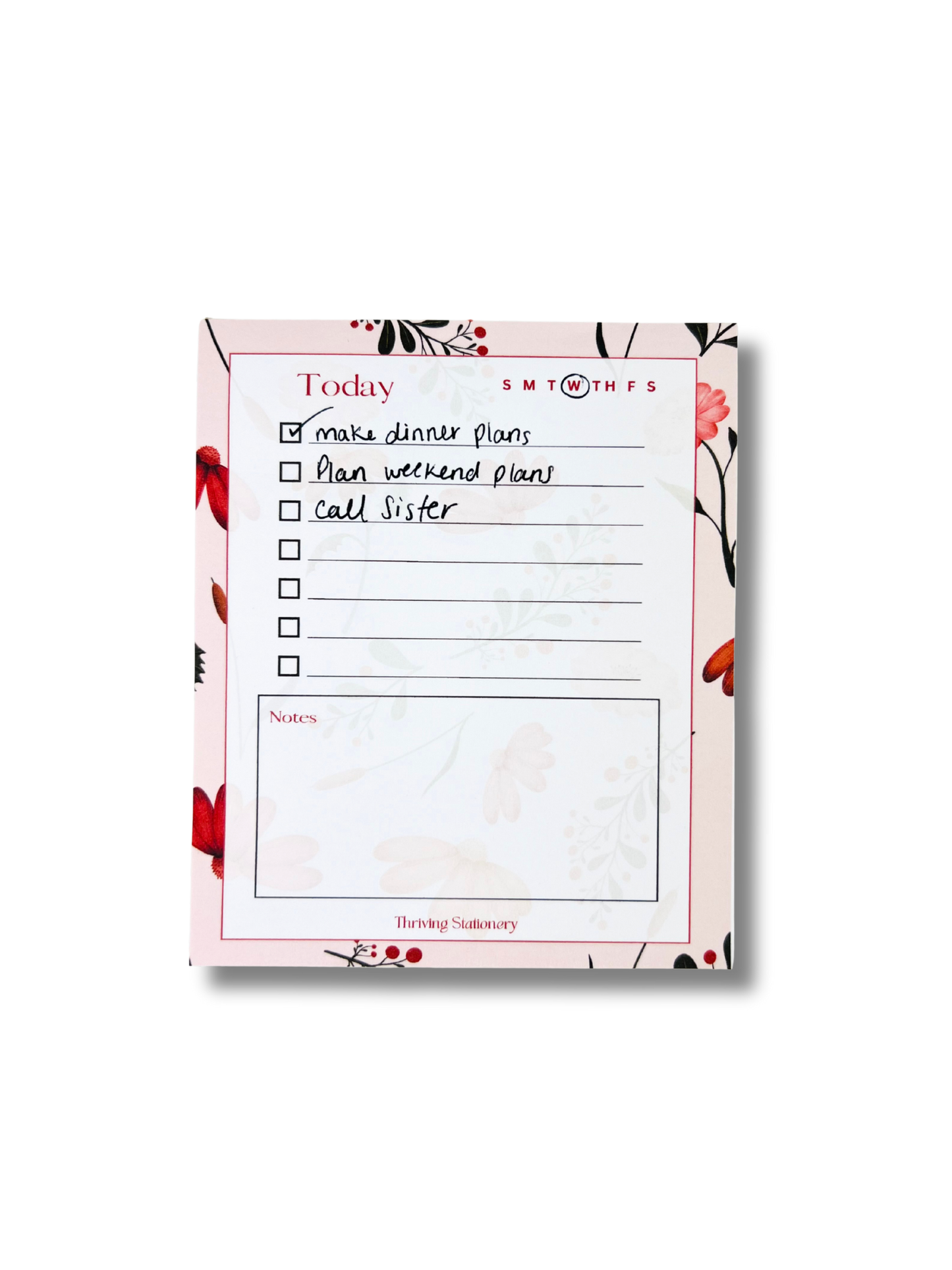 Pink Botanical Daily Planner Notepad with floral border, to-do list, and notes section with writing