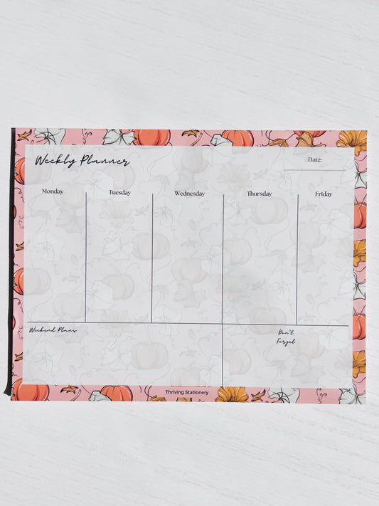 A fall-themed weekly planner with a pumpkin pattern border and a text area for weekly planning.