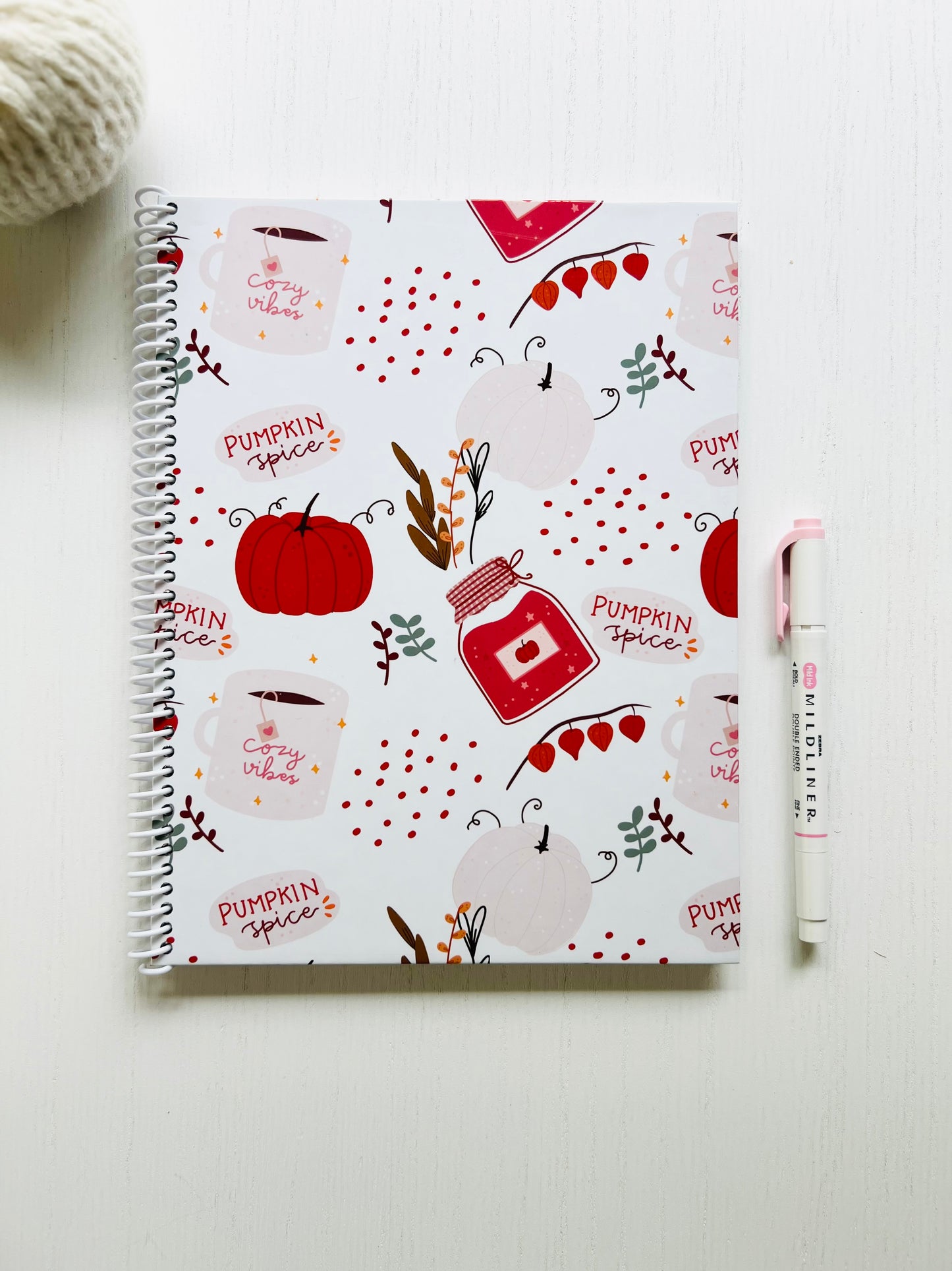 Fall-themed notebook with cozy tea and pumpkin design, lined interior pages perfect for journaling, planning, and seasonal note-taking.