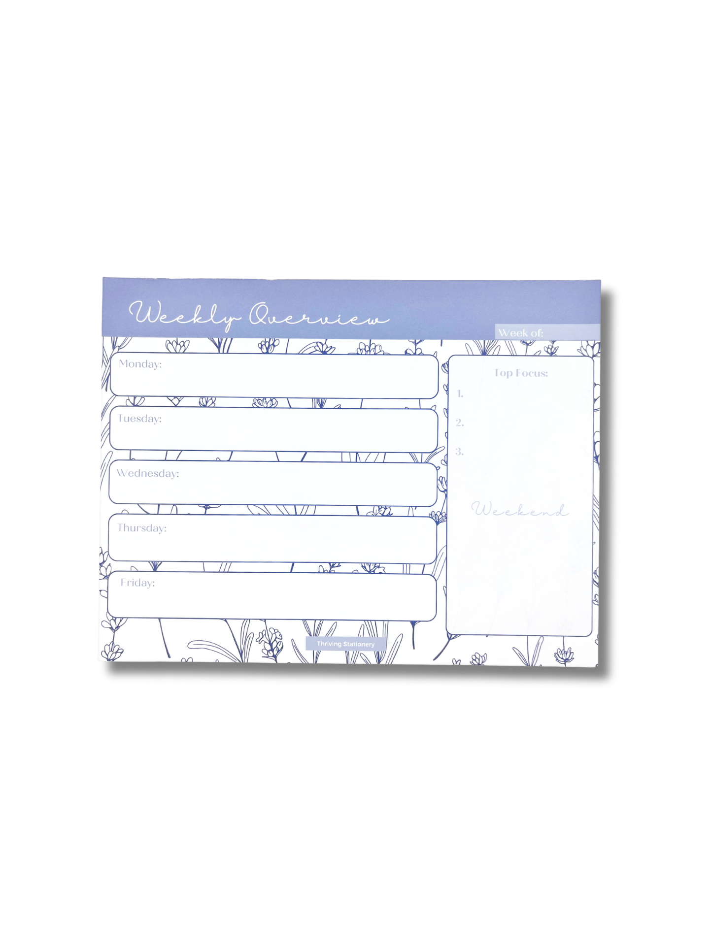 Weekly overview planner pad with floral design on a white background
