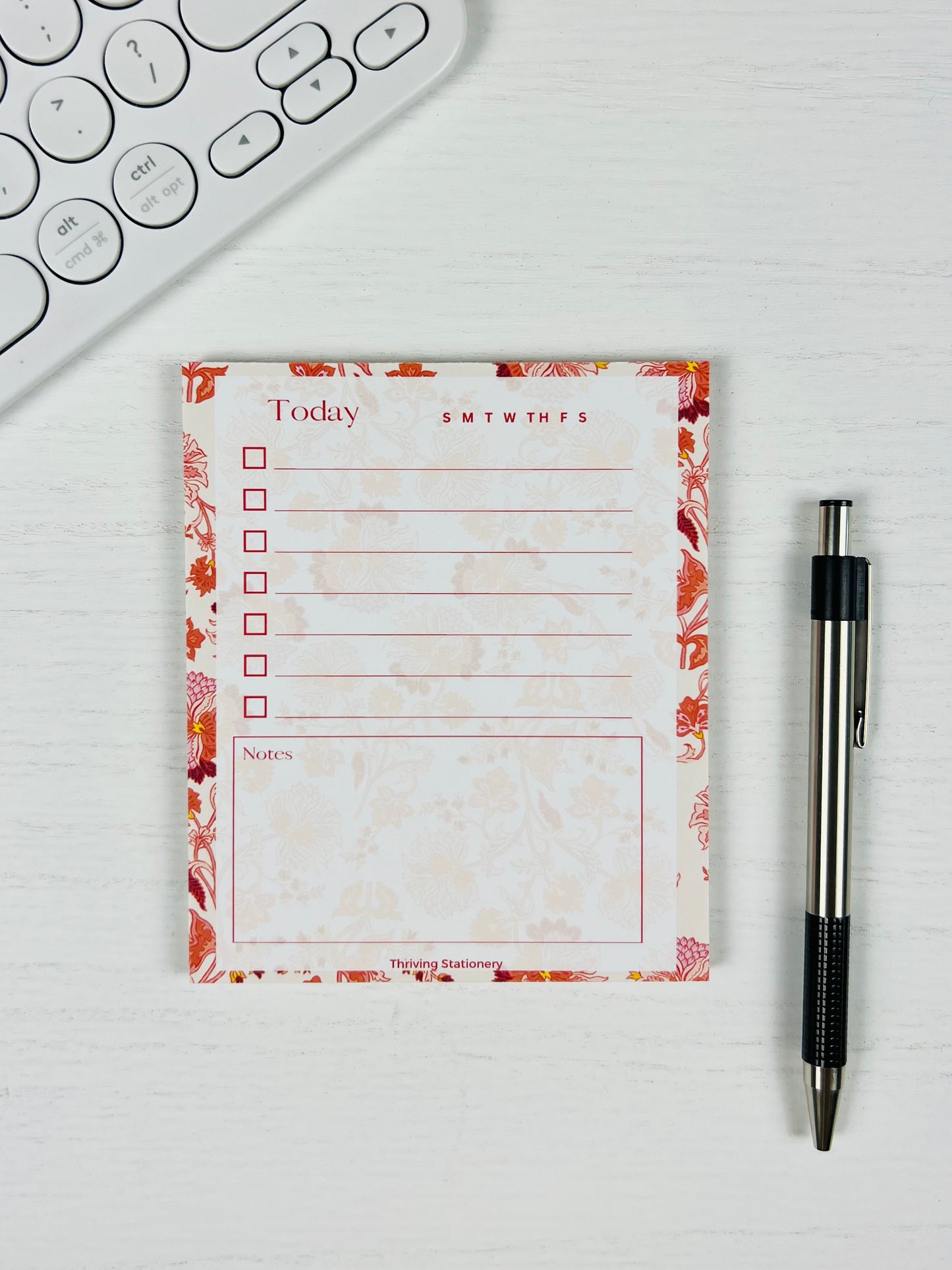 Roses in Bloom To-Do List Notepad with pink rose floral design and daily checklist layout with pen for scale