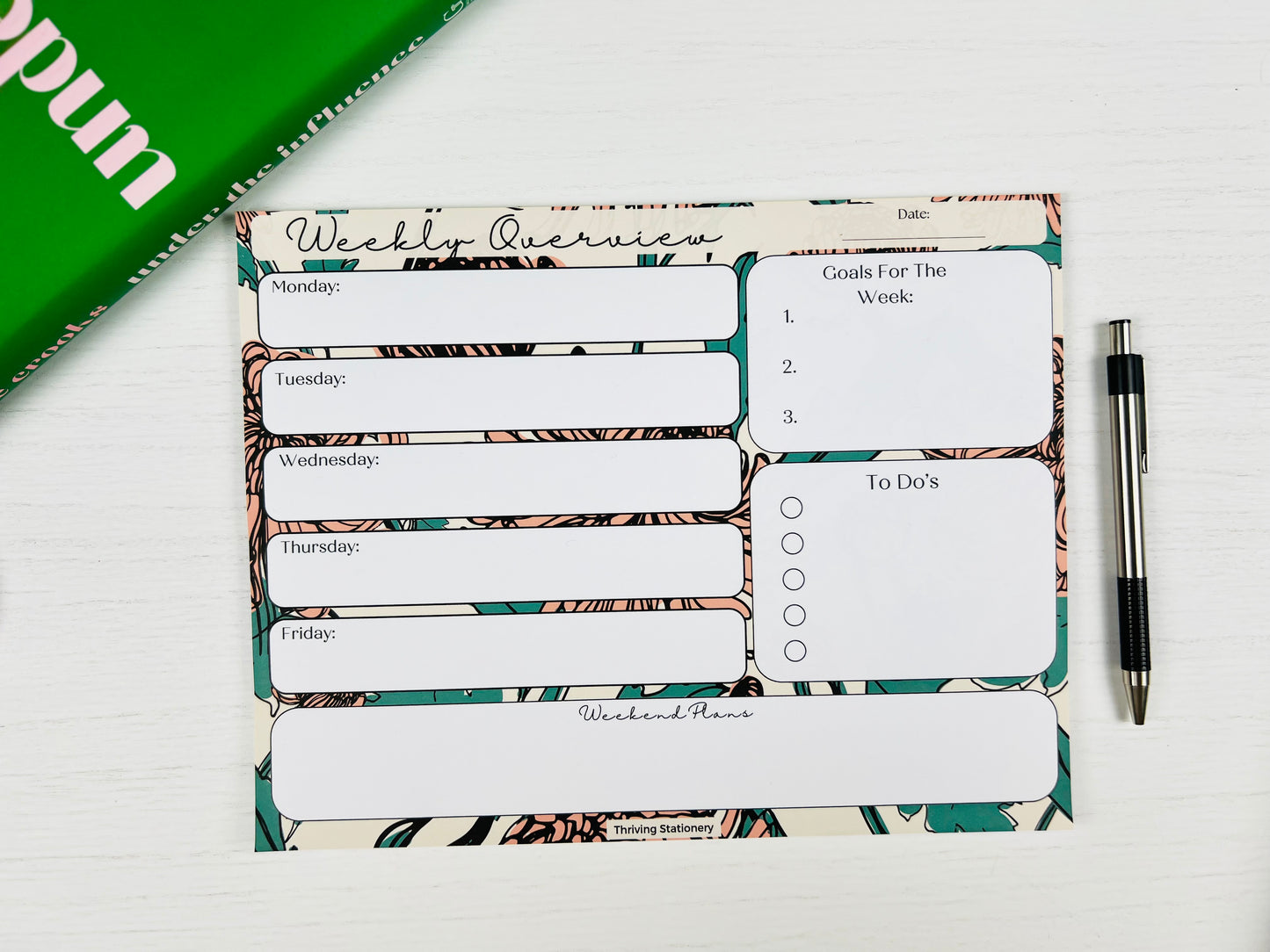 Bold Floral Weekly Planner with vibrant floral design and weekly layout