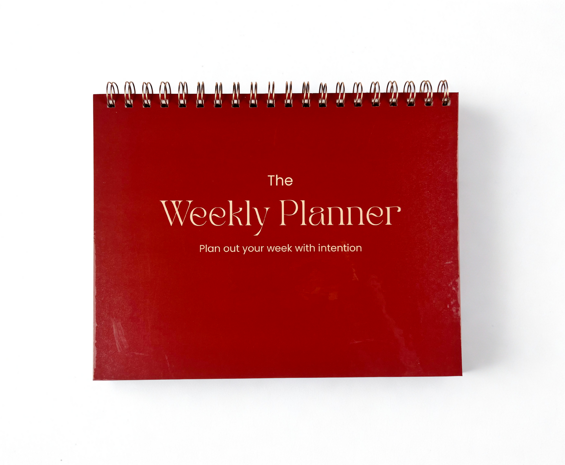 Red weekly planner with text on a white background