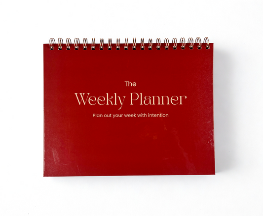 Red weekly planner with text on a white background
